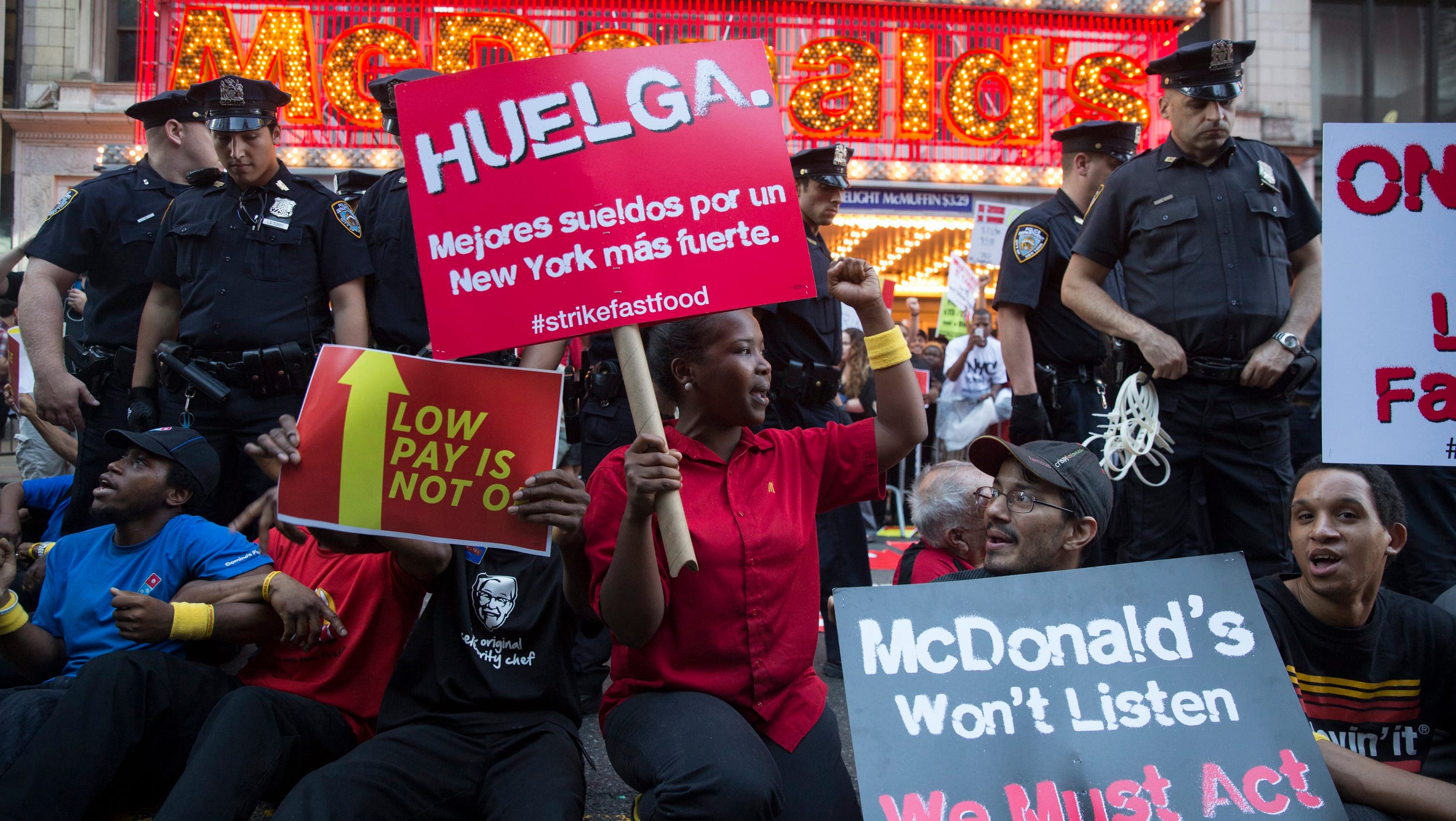 Thousands of fastfood workers strike; arrests made