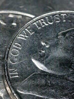 National motto on U.S. currency.