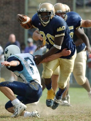 LeSean McCoy gets past a defender while playing for Bishop McDevitt High School.