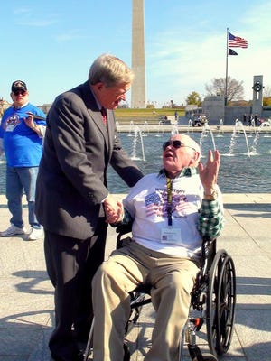 Christopher "Kit" Bond welcomes veterans in a past Ozarks Missouri Honor Flight.