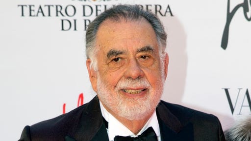 FILE - In this May 22, 2016 file photo, director Francis Ford Coppola poses for photographers as he arrives for the premiere of Verdi's "La Traviata'' at the Rome Opera House, in Rome. The 16th Tribeca Film Festival will close with a “Godfather” cast reunion and a back-to-back screening of parts one and two of Coppola’s classic saga. Tribeca announced Wednesday, March 8, 2017, that the 45th anniversary screenings will be followed by a conversation with Coppola, Al Pacino, Diane Keaton, Robert Duvall, James Caan, Talia Shire and festival co-founder Robert De Niro.