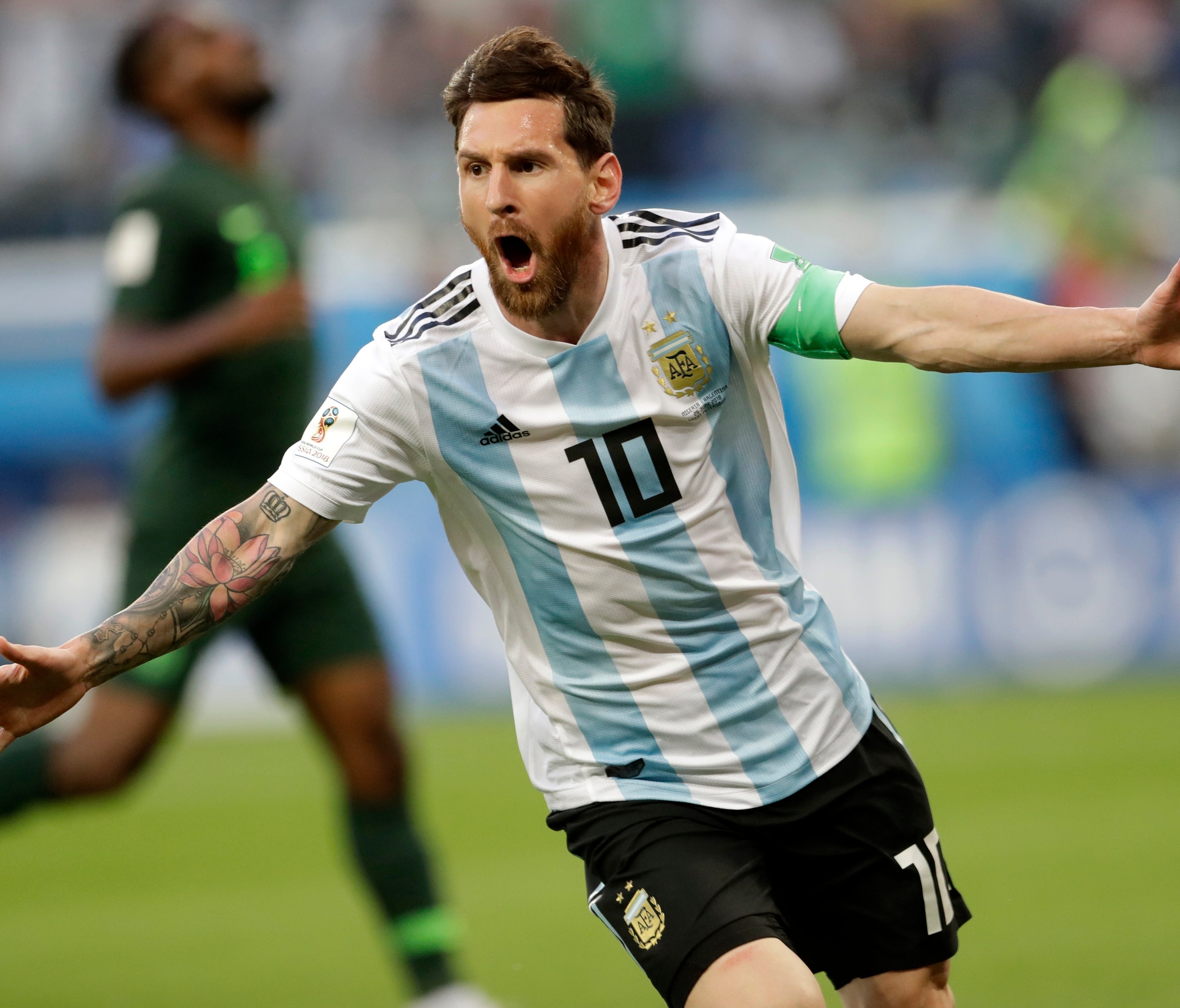 Lionel Messi celebrates after scoring against Nigeria.