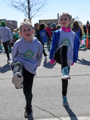 Sienna Heath (right), from Urbandale, dances an Irish