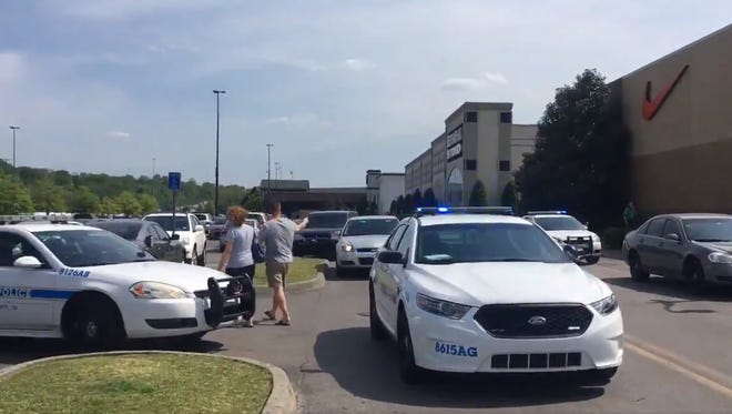 Emergency personnel surround Opry Mills Mall Thursday, May 3, 2018, in Nashville, Tenn., after police responded to a shooting.