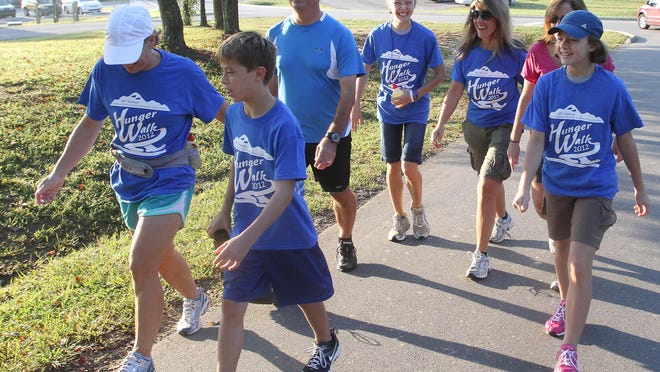 Members of the Etowah United Methodist Church take part in the Henderson County Hunger Coalition's 30th annual Walk for Hunger back in 2012 at Jackson Park.