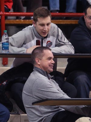 Butler's Chris Holtmann (foreground) and Ohio State assistant Greg Paulus (top) watch the action between Southport and Park Tudor, Jan. 14, 2015.