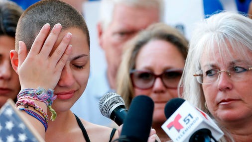 Marjory Stoneman Douglas High School student Emma Gonzalez reacts during her speech at a rally for gun control at the Broward County Federal Courthouse in Fort Lauderdale, Fla., on February 17, 2018.
