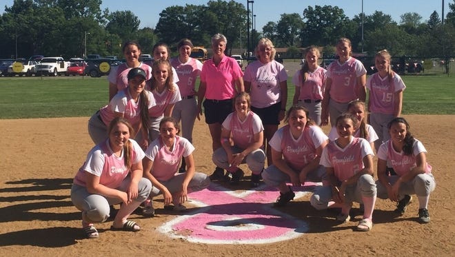 Pennfield softball team raised $300 for its Strike Out Cancer game on Thursday.