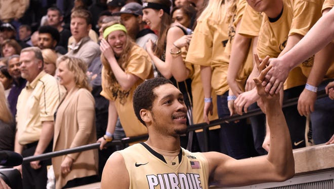 Mar 7, 2015; West Lafayette, IN, USA; Purdue Boilermakers center A.J. Hammons (20) connects with members of the Paint Crew after the game at Mackey Arena. Purdue defeated Illinois 63-58. Mandatory Credit: Sandra Dukes-USA TODAY Sports