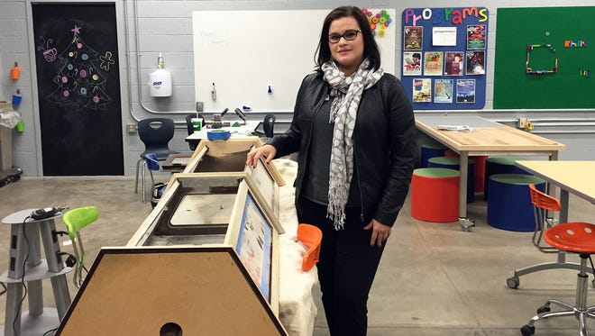 Rachel Arizaga, director of Morale, Welfare and Recreation-run libraries at Fort Bliss, shows off the MakerSpace at the Mickelsen Community Library.