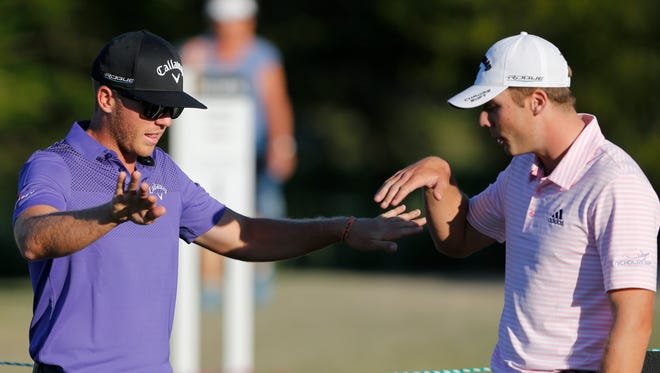 Taylor Gooch (left) and Sam Burns talk on the seventh hole during the first round of the Arnold Palmer Invitational golf tournament at Bay Hill Club & Lodge . Mandatory Credit: Reinhold Matay-USA TODAY Sports