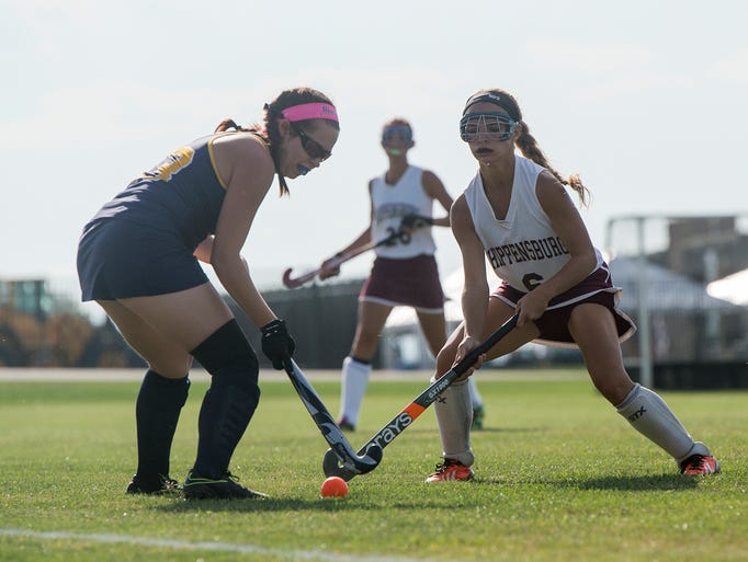 Greencastle's Logan Yaukey, left, battles it out for