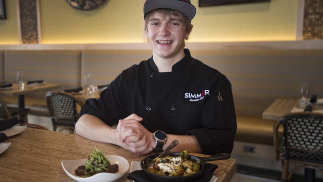 Executive Chef Logan Kamer poses for a portrait at Simmer on Thursday, March 1, 2018. The 21-year-old has helped open three Fort Collins restaurants in the last 10 months.