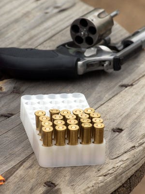 -

-Rounds are ready to be fired during a handgun-qualification shooting session.