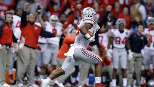 Ohio State running back Ezekiel Elliott (15) runs toward the end zone against Alabama in the second half of the Sugar Bowl NCAA college football playoff semifinal game, Thursday, Jan. 1, 2015, in New Orleans. Elliott scored a touchdown on the play.