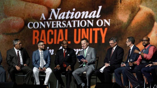 Pastor Ronnie Floyd, center, president of the Southern Baptist Convention, conducts a discussion on race with fellow religious leaders during a meeting of the Southern Baptist Convention Tuesday, June 14, 2016, in St. Louis.