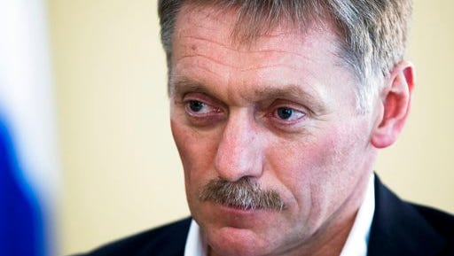 In this photo taken on Thursday, April 6, 2017, President Vladimir Putin's spokesman Dmitry Peskov speaks with The Associated Press in Moscow, Russia in Moscow, Russia. "President (Vladimir) Putin believes that the U.S. strikes on Syria represent an aggression against a sovereign state in violation of international law under a far-fetched pretext," Putin's spokesman Dmitry Peskov said in a statement. "Washington's move deals a significant blow to the Russia-U.S. relations, which are already in a deplorable shape."