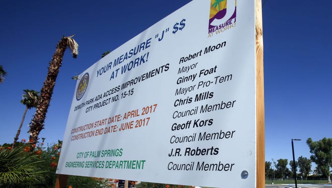 A sign near Demuth Park touts the city's use of Measure J funds to improve the park. Palm Springs is now asking voters to increase the city sales tax again, to pay for public safety services.