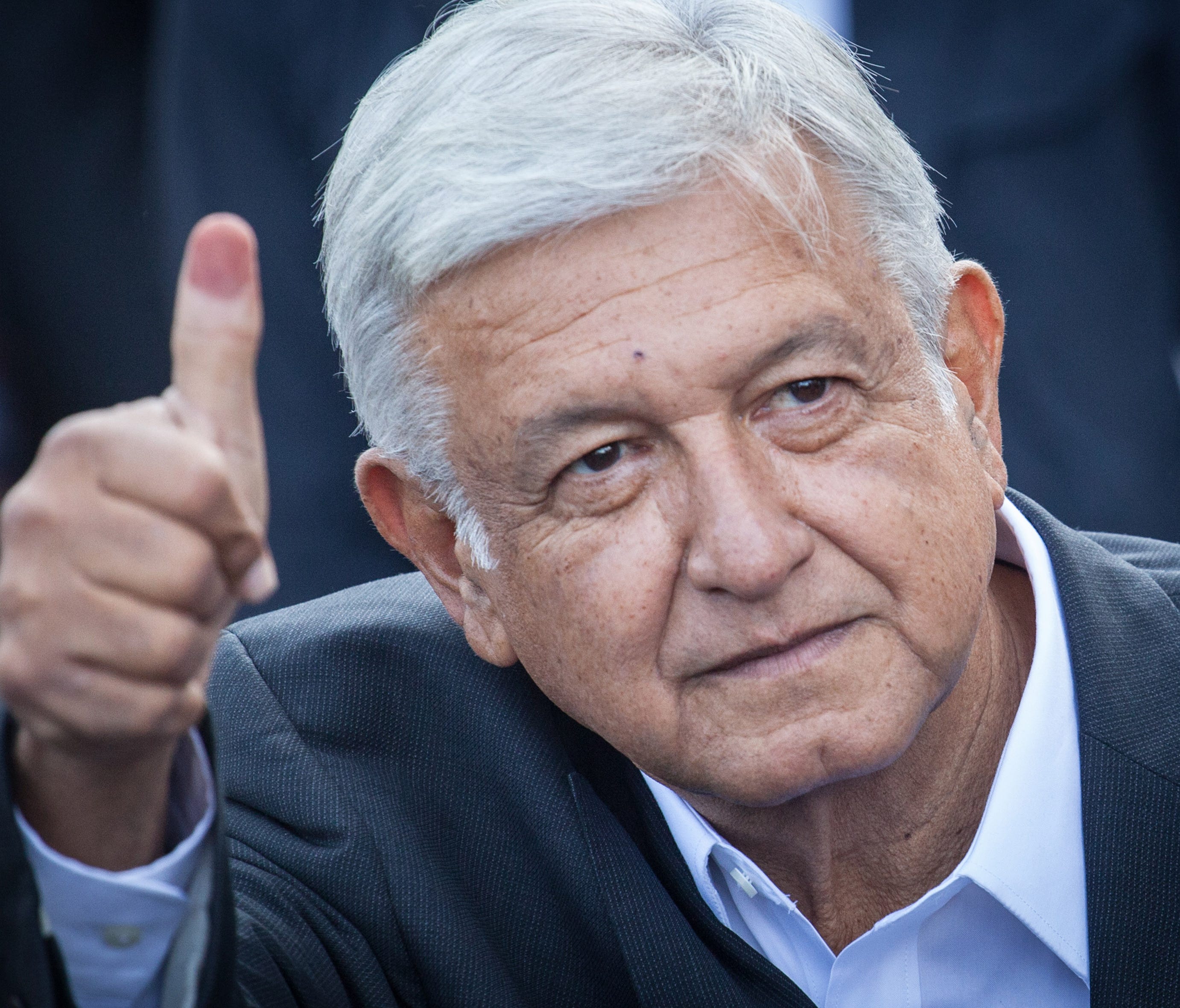 Presidential candidate Andres Manuel Lopez Obrador waves after voting in Mexico's presidential election on July 1, 2018, in Mexico City.