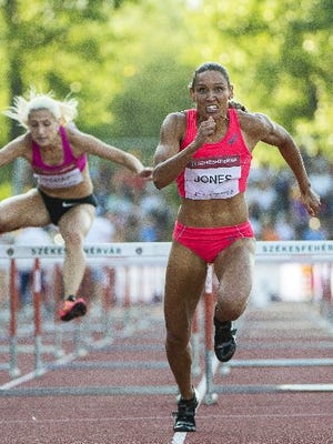 Could Lolo Jones outrun Ronda Rousey? Just kidding.