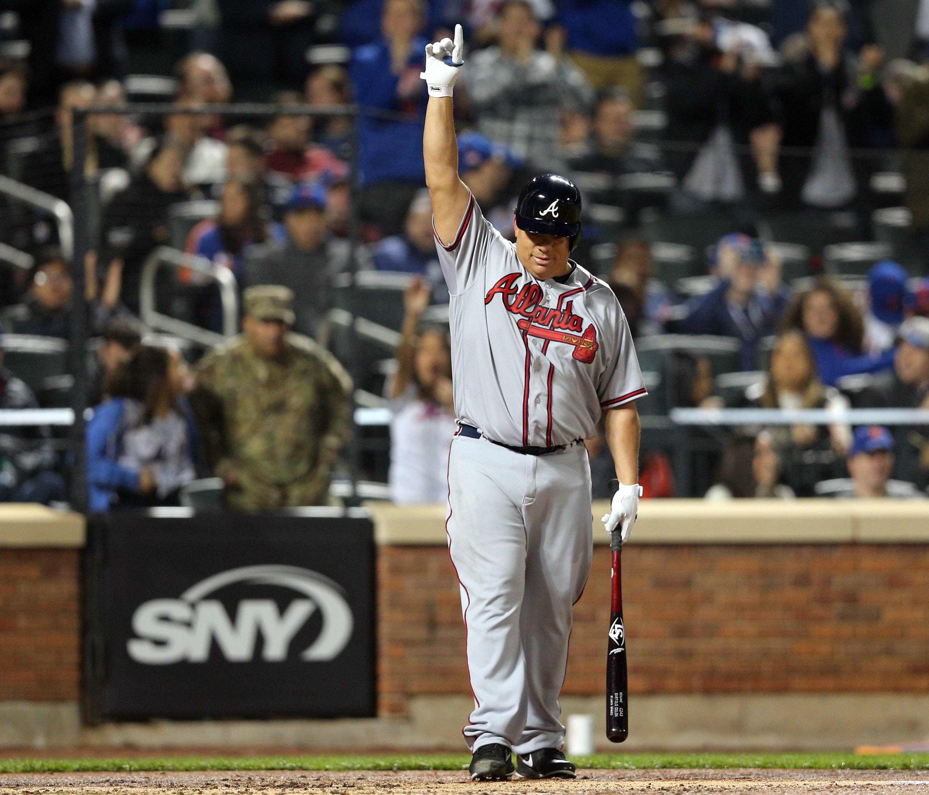 Apr 5, 2017; New York City, NY, USA; Atlanta Braves starting pitcher Bartolo Colon (40) acknowledges the fans as he bats during the third inning against the New York Mets at Citi Field. Mandatory Credit: Brad Penner-USA TODAY Sports ORG XMIT: USATSI-