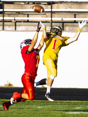 Clay Dean of Butte High defends a pass intended for Bryce Cuchine of CMR during the 69th annual Shrine Football Game at Memorial Stadium on Saturday.