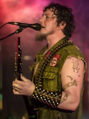 Photographer Ralph Smith captured Tyler Heppner of Chainbound on guitar and vocals. Six bands will play a benefit for Smith, who was injured while working, 2 to 8 p.m. April 2 at Westside Station. Cost is $5.