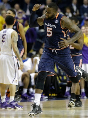 Auburn forward Cinmeon Bowers (5) celebrates a clock violation against LSU during the second half of an NCAA college basketball game in the quarterfinal round of the Southeastern Conference tournament, Friday, March 13, 2015, in Nashville, Tenn. (AP Photo/Mark Humphrey)