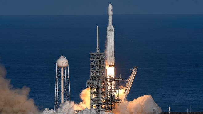 SpaceX's Falcon Heavy rocket launches on its demonstration flight from Kennedy Space Center on Feb. 6, 2018.