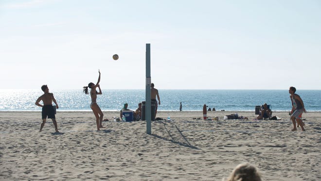 Venice Beach is a great scene for active beachgoers. Try a game of pick-up beach volleyball.