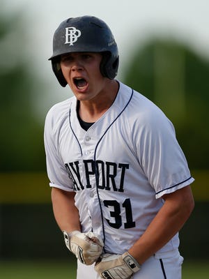 Bay Port's Connor Sullivan (31) screams with emotion after getting a base hit in the bottom of the seventh inning during Tuesday's game against Green Bay Preble in Suamico. 