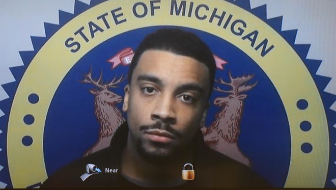 Detroit police officer Richard Billingslea is arraigned by video in front 36th District Court in Detroit Thursday.