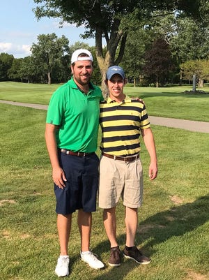 Christopher Cooley and Matt Cooley at the Plum Hollow Country Club golf course two days after they helped to save the life of David Wujczek.