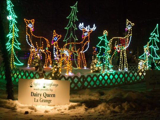 Christmas lights illuminate the snowy lawn of the LaGrange court house during the Light Up LaGrange celebration.  December 6, 2013.