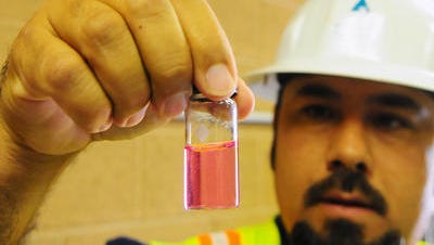 Technician James Baca analyzes a water sample July 12 in Albuquerque, N.M.