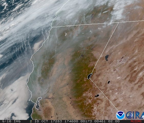 Smoke from fires in California is visible on this Oct. 10, 2017 satellite image from the National Oceanic and Atmospheric Administration.