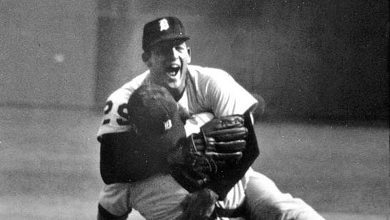 Tigers pitcher Mickey Lolich leaps into the grasp of Bill Freehan after the Tiger catcher hauled in the final out in St. Louis, to give the Tigers the 1968 World Series title over the Cardinals, Thursday, Oct. 10, 1968.