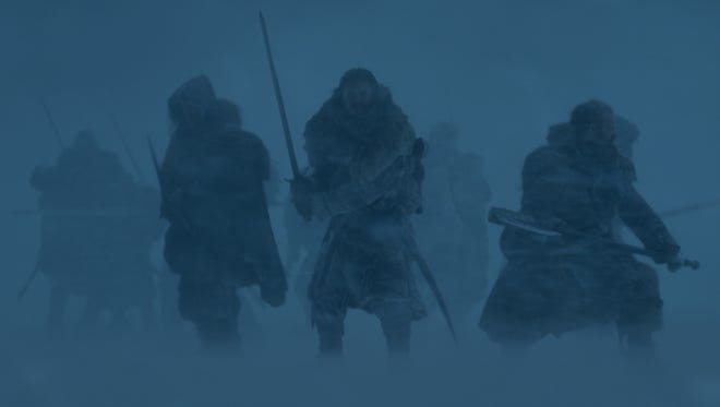 Jon Snow, center, and Tormund Giantsbane, right, brace themselves for action. (Episode 6)