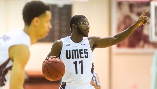 UMES guard Ahmad Frost (11) directs traffic against Fairfield in 2015 at the Hytche Center in Princess Anne.