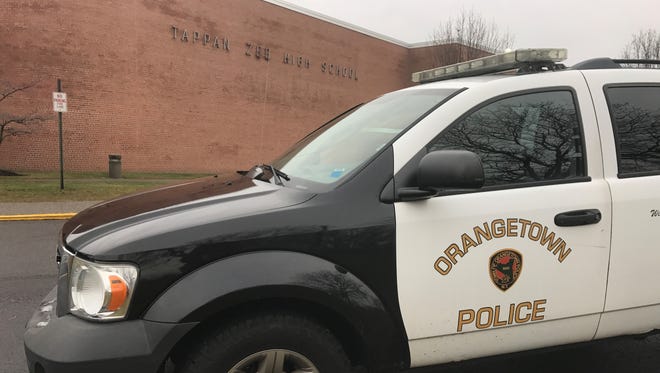 An Orangetown police car at Tappan Zee High School after a threat prompted evacuation of the school, Dec. 12, 2016.