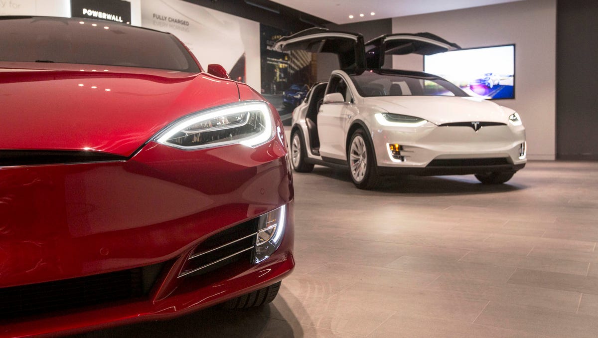 The Tesla Model S, left, and the Model X are seen in the showroom at Somerset Collection North in Troy on Thursday, October 26, 2017.