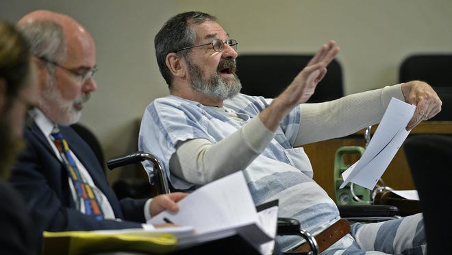 Frazier Glenn Miller Jr. gestures Friday during pre-trial motions for his case at Johnson County District Court, in Olathe, Kan.