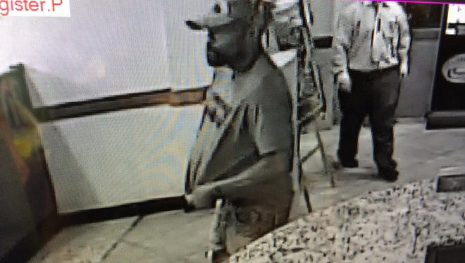 Police are searching for this suspect in the theft of a cancer research donation jar in Deptford.
