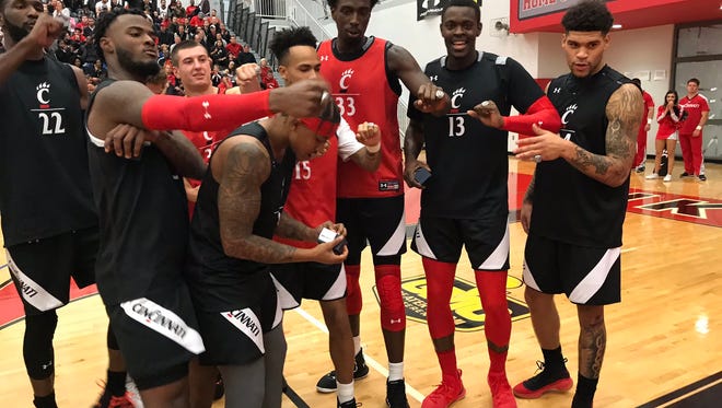 University of Cincinnati basketball returnees were presented their 2017-18 AAC championship rings before Thursday night's scrimmage at Princeton High School.