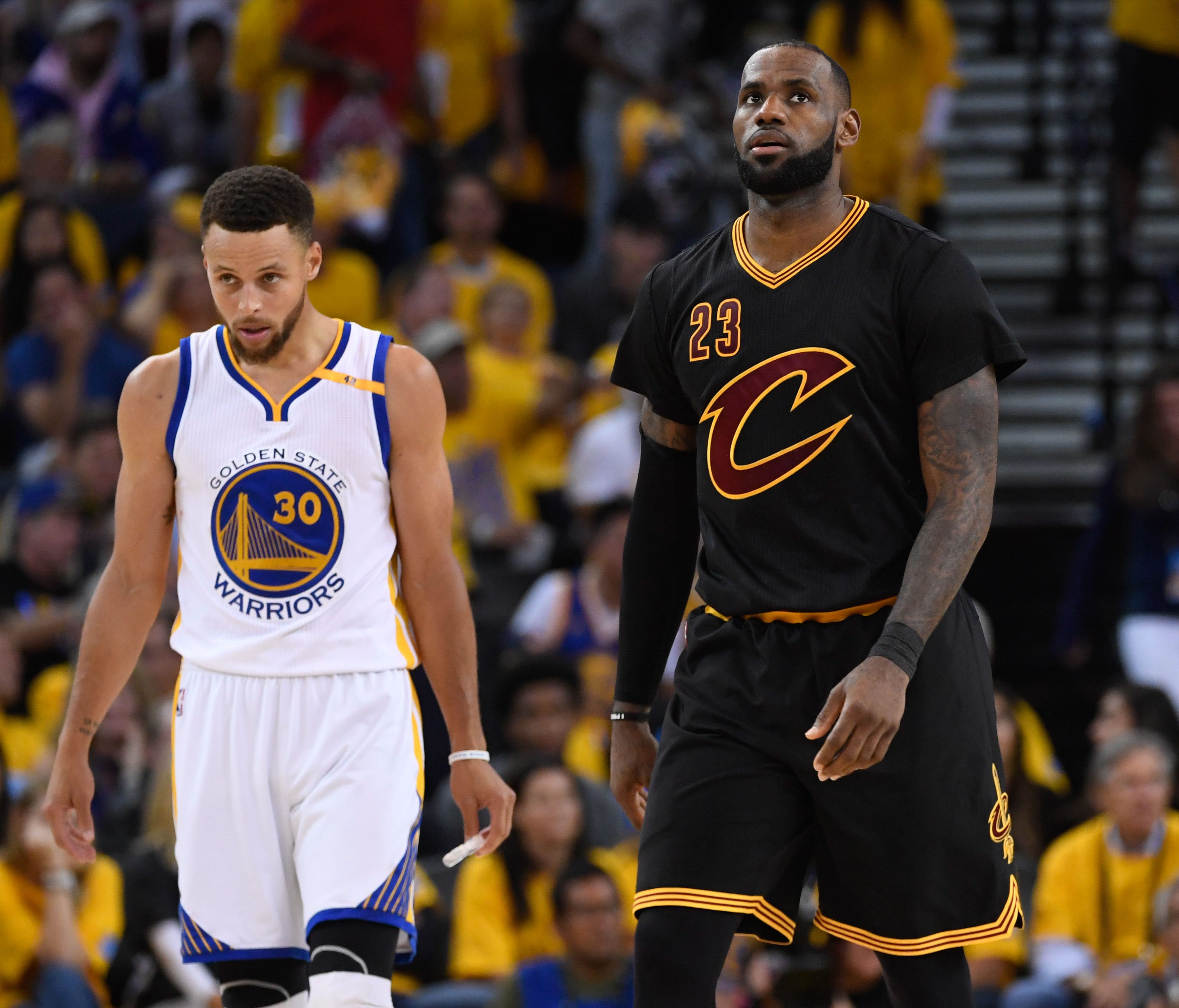Golden State Warriors guard Stephen Curry (30) and Cleveland Cavaliers forward LeBron James (23) during the fourth quarter in game two of the 2017 NBA Finals at Oracle Arena.
