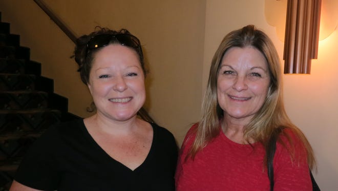 Caroline Lenny (left) and Linda Seiberling, both of Junction City, attend the "Gone with the Wind" film party Feb. 12 at the Cascade Theatre in Redding.