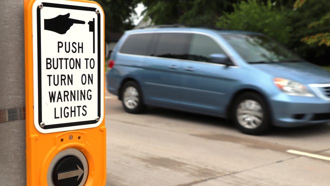 Pedestrians can activate warning lights at the crosswalk on North Meade Street at Florida Avenue in Appleton. The city has plans for similar improvements on East College Avenue at Schaefer Street.