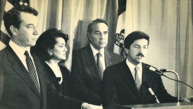 Gov. Branstad assails the Farm Credit System during a news conference on Oct. 24, 1985. With Branstad are Iowa Sen. Chuck Grassley, left, and U.S. Transportation Secretary Elizabeth Dole.