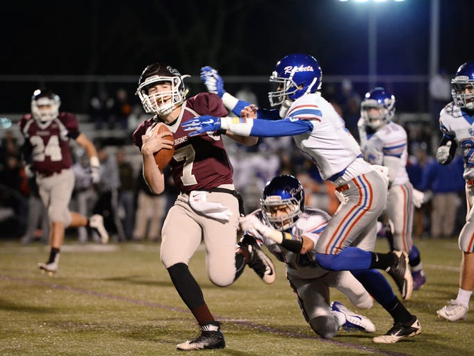 Manheim Central's Kody Kegarise sheds a couple tackles