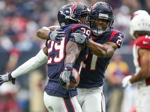 Houston Texans free safety Andre Hal celebrates with